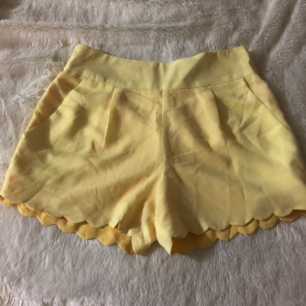 Scallops cut yellow shorts from urban outfitters